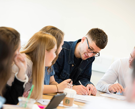 Students working together at desk